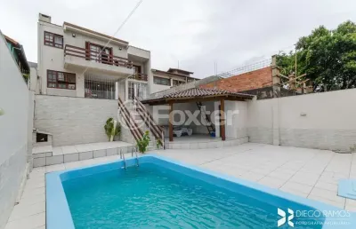 Casa com 4 quartos à venda na rua paul harris, 130, jardim itu sabará, porto alegre, 245 m2 por r$ 1.450.000