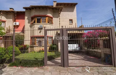 Casa com 3 quartos à venda na rua jacundá, 625, guarujá, porto alegre, 180 m2 por r$ 650.000