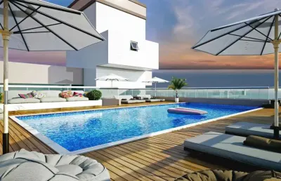 Frente mar,entrada em 3x ,sacada gourmet e 2 vagas ,  com lazer completo
