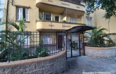 Apartamento padrão 2 dormitórios frente térreo com área externa