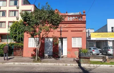 Casa com 3 quartos à venda na Avenida Cairu, 379, Navegantes, Porto Alegre
