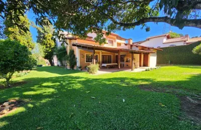 Casa em condomínio para venda com 4 quartos, sendo 3 suítes, 314m²
