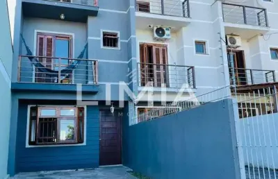 Casa com 3 quartos à venda na rua hugo nelson magalhães, 141, parque santa fé, porto alegre, 170 m2 por r$ 425.000