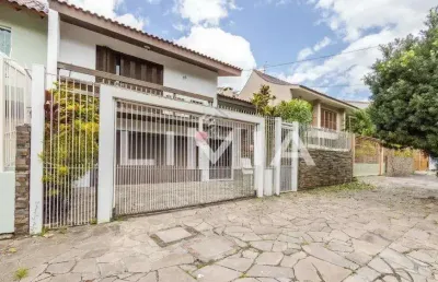Casa com 4 quartos à venda na rua maestro salvador campanella, 58, jardim itu sabará, porto alegre, 240 m2 por r$ 995.000