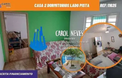 Casa 2 dormitorios lado pista financiamento bancario mongagua