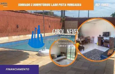 Sobrado 2 dormitorios piscina churrasqueira lado pista financia mongagua