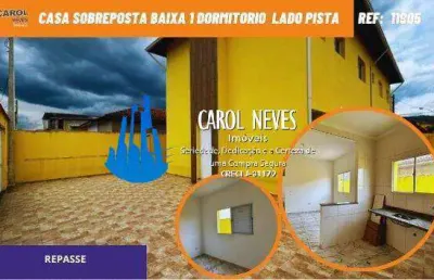 Casa sobreposta baixa 1 dormitorio repasse lado pista itanhaem