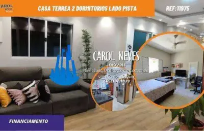 Casa terrea 2 dormitorios lado pista financiamento bancario itanhaem