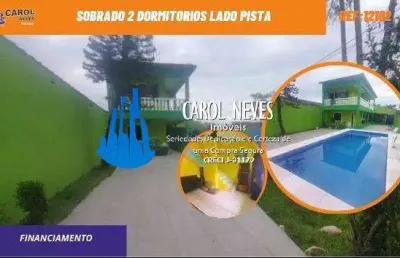 Sobrado 2 dormitorios lado pista financiamento bancario mongagua
