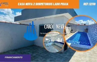 Casa nova geminada 2 dormitorios piscina financiamento lado praia itanhaem