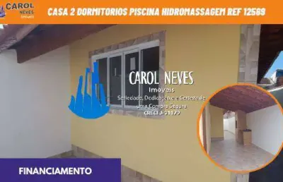 Casa 2 dormitorios piscina lado pista financiamento bancario itanhaem