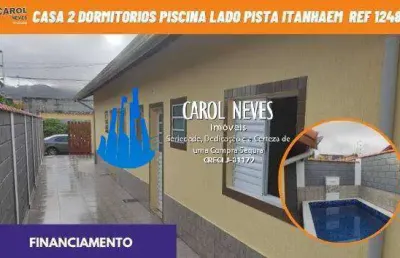 Casa 2 dormitorios 1 suite piscina lado pista financiamento itanhaem