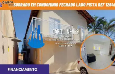 Sobrado em condominio fechado 2 dormitorios lado pista financiamento