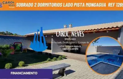 Sobrado condominio fechado 2 dormitorios lado pista financiamento mongagua