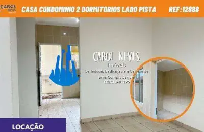 Casa condominio locacao  2 dormitorios lado pista mongagua