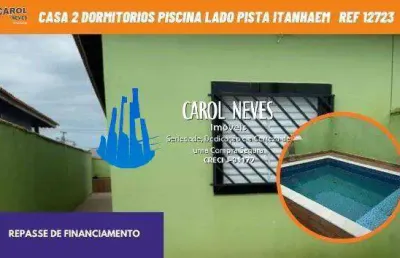 Casa 2 dormitorios com piscina lado pista repasse financiamento itanhaem