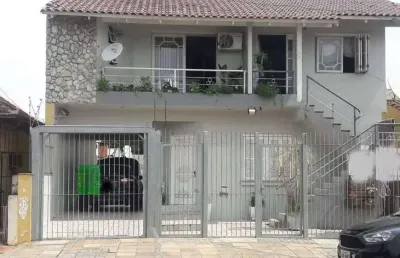 Casa com 4 quartos à venda na rua saldanha da gama, --, harmonia, canoas por r$ 607.000