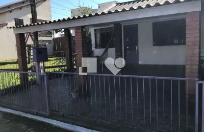 Casa em condomínio fechado com 2 quartos à venda na rua camboatás, --, igara, canoas por r$ 270.000