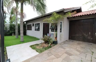 Casa com 4 quartos à venda na avenida doutor severo da silva, --, mont serrat, canoas por r$ 1.010.000