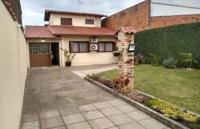 Casa com 4 quartos à venda na rua carazinho, --, mathias velho, canoas por r$ 635.000