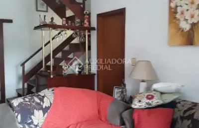Casa em condomínio fechado com 3 quartos à venda na rua marciano ribeiro, 43, medianeira, porto alegre, 165 m2 por r$ 520.000