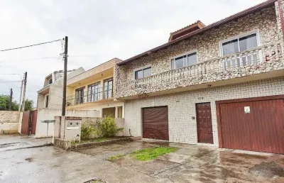 Casa à venda na Rua Martins Fontes, 212, Fazendinha, Curitiba