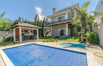 Casa com piscina no condominio le parc com 4 suites