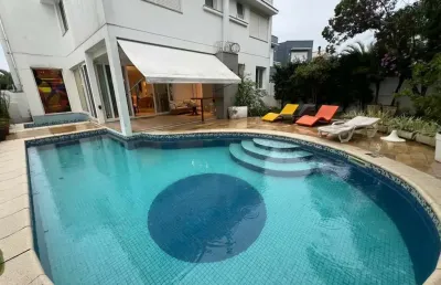 Casa com 4 quartos à venda na rua dos botos, 66, jurerê internacional, florianópolis por r$ 5.800.000