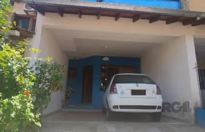 Casa com 3 quartos à venda na Rua James Bocacio, 208, Hípica, Porto Alegre