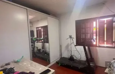 Casa em condomínio fechado com 3 quartos à venda na Avenida Edgar Pires de Castro, 1286, Hípica, Porto Alegre