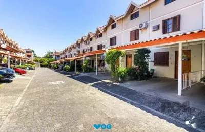 Casa em condominio no bairro tristeza de 3 dormitórios e vaga
