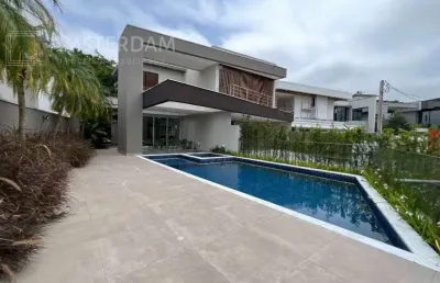 Casa de alto padrão a venda no condominio riviera de são lourenço