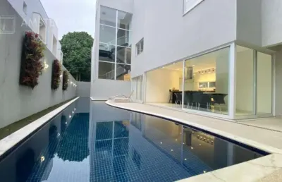 Imperdível casa de alto padrão em condomínio na riviera, bertioga-sp: 5 quartos, 5 suítes, 2 salas, 6 banheiros, 4 vagas, 513,80 m² de área.