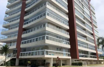 Apartamento em predio frente ao mar, com 2 dormitórios mobiliado.