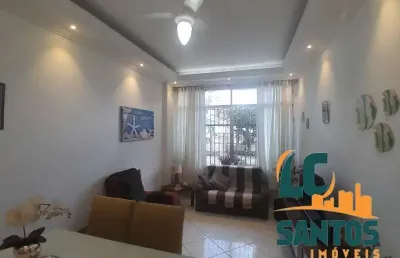 Apartamento térreo reformado na praia do embaré em santos .