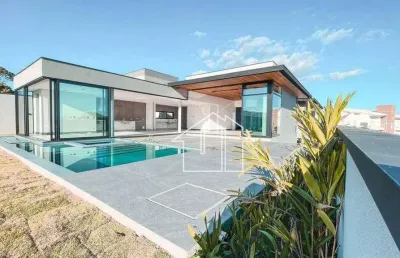 Casa com 4 dormitórios à venda, 600 m² por r$ 6.450.000,00 - condomínio reserva do paratehy - são josé dos campos/sp