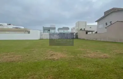 Terreno à venda em condomínio na cidade de itanhaém-sp, guacira - 300m² de área!