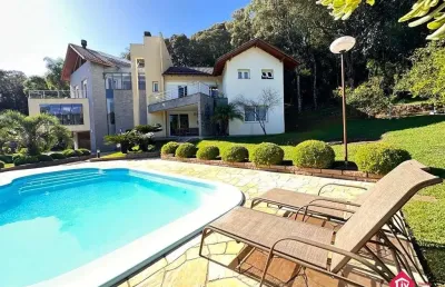 Casa em condominio para venda - 583m², 4 dormitórios, sendo 3 suites, 4 vagas - linha 40