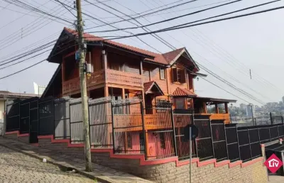 Casa com 4 quartos à venda na rua joão bettega, 1111, salgado filho, caxias do sul por r$ 1.150.000