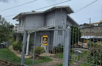 Casa com 3 quartos à venda na fulvio minghelli, 858, salgado filho, caxias do sul por r$ 990.000