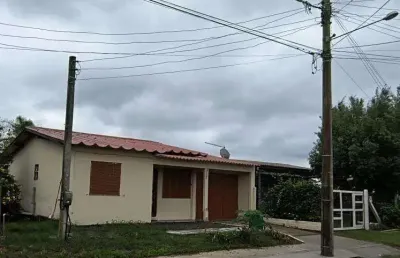 Casa 02 dorm à venda no bairro capão novo - 2 vagas de garagem