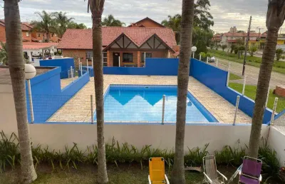 Sobrado 2 dorm e meio à venda no bairro capão novo com 79 m² de área privativa - 1 vaga de garagem