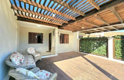 Casa 02 dorm à venda no bairro capão novo - 2 vagas de garagem