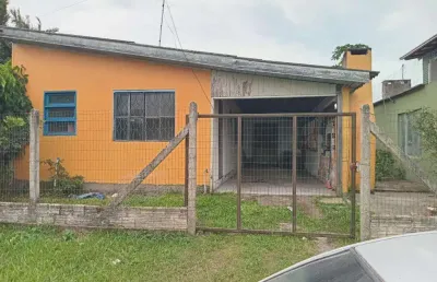 Casa 02 dorm à venda no bairro capão novo - 2 vagas de garagem