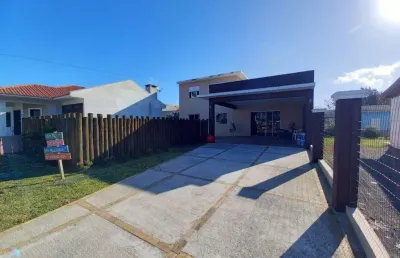 Casa 02 dorm à venda no bairro capão novo - 2 vagas de garagem