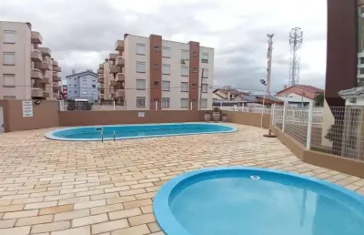 Apartamento 02 dorm à venda no bairro capão novo - 1 vaga de garagem