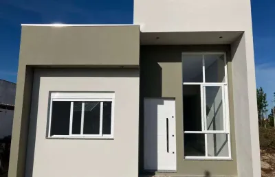 Casa 02 dorm à venda no bairro capão novo - 2 vagas de garagem