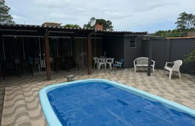 Casa 02 dorm à venda no bairro capão novo - 2 vagas de garagem