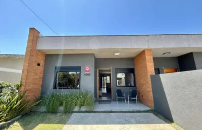 Casa geminada 2 dorm à venda no bairro capão novo com 73 m² de área privativa - 1 vaga de garagem