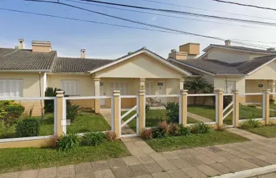 Sobrado 02 dorm à venda no bairro capão novo - 1 vaga de garagem